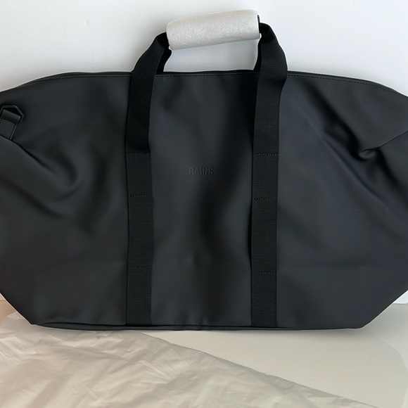 Rains Large Waterproof Weekend Bag. Brand new with bag.